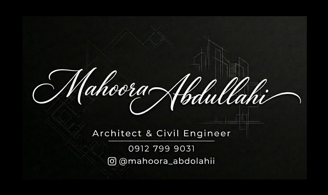 مهندس در حال بررسی نقشه‌های اجرایی پروژه عمرانی